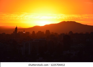 Sunset clouds and cityscape