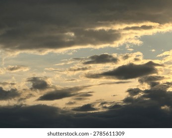 Sunset clouds creating atmospheric evening sky scene and natural outdoor weather environment