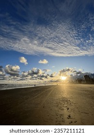 Sunset with clouds on the beach