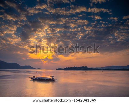 Sunset clouds over the river Brahmaputra, in Guwahati, Assam, India