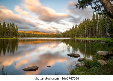 Sunset clouds reflecting in Dog Lake in Tuolumne Meadows in Yosemite National Park, California - Powered by Shutterstock