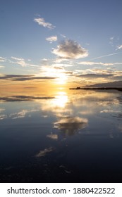 sunset with clouds in the water