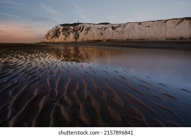 Sunset at the coast of Cap Blanc-Nez at the pas-de-calais. Landscape of northern France with cliffs at the beach. Beautiful scenery at the opal coast (côte d'opale) in hauts-de-france. 
