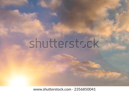 Sunset colored Sky soft clouds