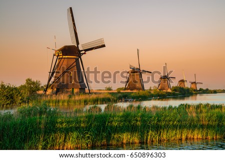 Sunset colors and the old windmills at Kinderdijk, Holland