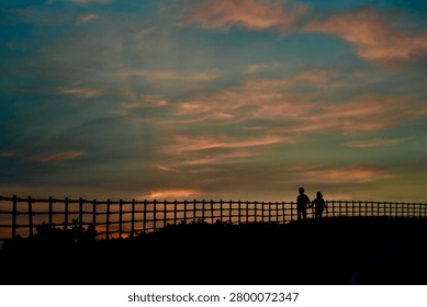 Sunset is the disappearance of the Sun at the end of the Sun path, below the horizon of the Earth due to its rotation.