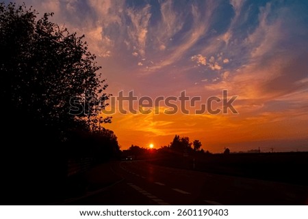Sunset with dramatic clouds near Alburg, Straubing, Bavaria, Germany