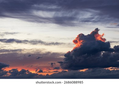 Sunset with dramatic sky. Cloudy sky at sunset. Real sky at sunset, with god rays and beautiful clouds.