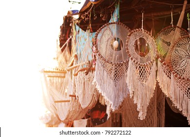 Sunset dreamcatchers at a market place. Boho chic decoration, ethnic amulet. Vintage. Tulum, Mexico.