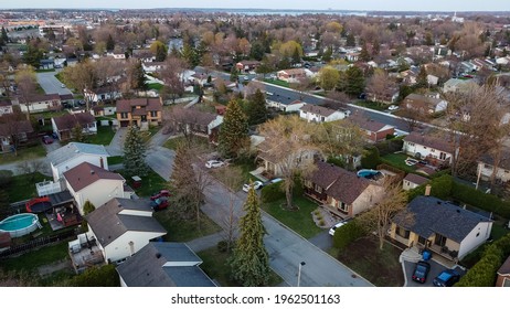 sunset drone and aerial pictures in a suburbs houses near montreal quebec canada 