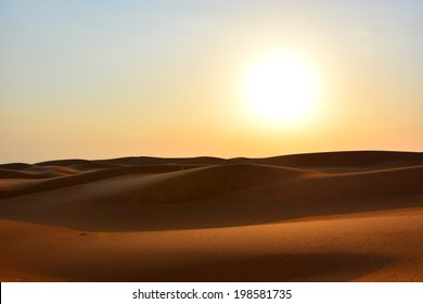 Sunset In Dubai Desert And Sand Dunes In Twilight