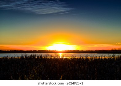 Sunset East Of Saskatoon, SK.  Taken Over A Pond In The Country Side