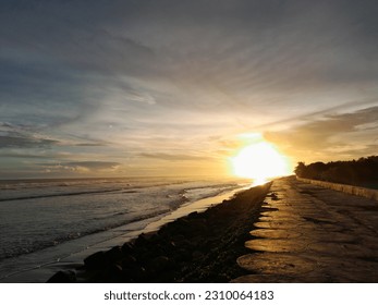 sunset at the end of beach 