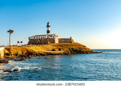 Sunset at the famous Farol da Barra in the city of Salvador, Bahia