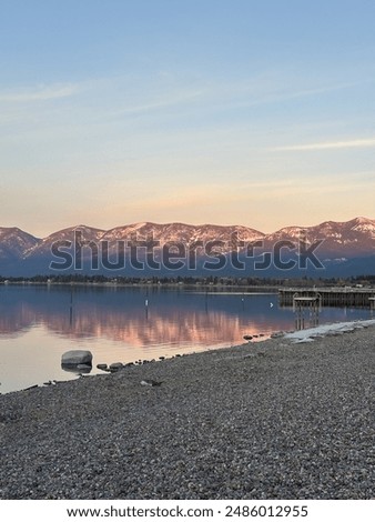 Sunset At Flathead Lake Reflection. Lake reflection. Sunset at the lake. Mission mountains sunset. Glacier lake.