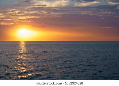 Sunset in the Florida sea with cute red, yellow, violet and orange colors