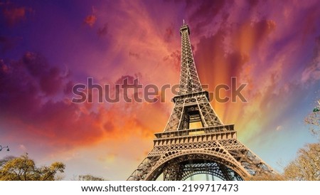 the sunset in front of the effiel tower