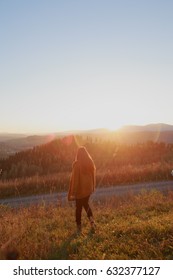 sunset girl among mountain meadows - Shutterstock ID 632377127