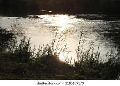 Sunset Glistening On Sabie River 