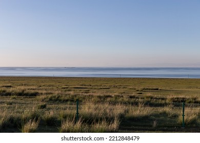 Sunset Glow Of Qinghai Lake, China