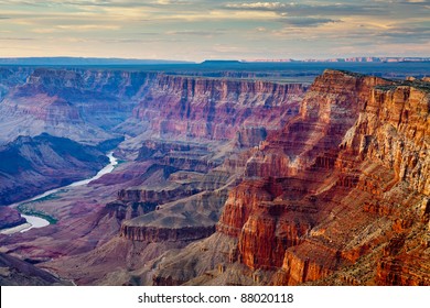 sunset at grand canyon desert point with river in the background