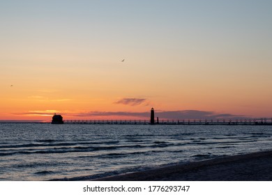 Sunset At The Grand Haven Beach