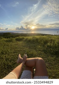 sunset at the grass field
