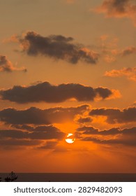 Sunset hiding in the clouds