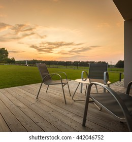 Sunset At Home Patio With Simple Furniture Set