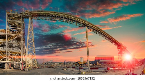 sunset at a huge conveyor belt at a processing plan in a diamond mine in Botswana