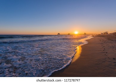 Sunset At Huntington Beach, California.