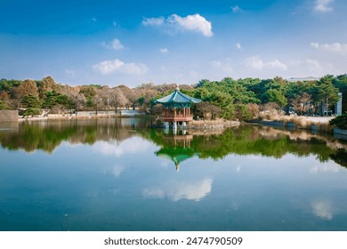 Sunset at the Hyangwonjeong Pavilion in the center of the pond in the Gyeongbokgung palace, Seoul, South Korea. - Powered by Shutterstock