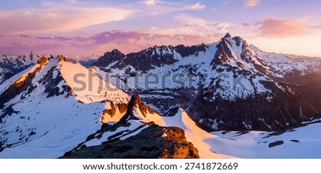 Sunset Illuminates a Panoramic View of Mt Shuksan and Icy Peak from Ruth Mountain.
North Cascades National Park, Washington.