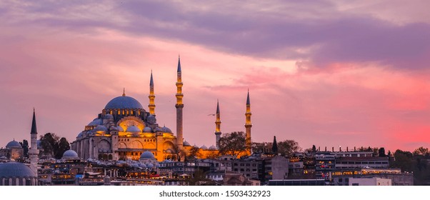 Sunset in Istanbul, Turkey with Suleymaniye Mosque (Ottoman imperial mosque). View from Galata Bridge in Istanbul. TURKEY