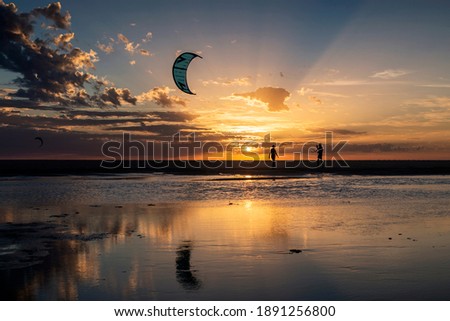 Sunset with kite reflections, Los Lances beach, Tarifa, Cadiz Province, Andalusia, Spain