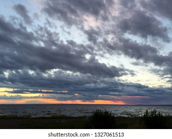 Sunset lake cloudy storm - Powered by Shutterstock