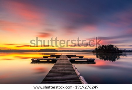 Sunset lake pier landscape view
