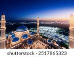 Sunset landscape big white mosque Astana Kazakhstan, aerial top view.