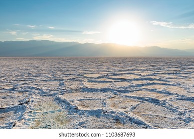 Sunset Landscape Of Salt Flats In The Badwater Basin At Summer Hot Evening, Death Valley National Park, California, USA.