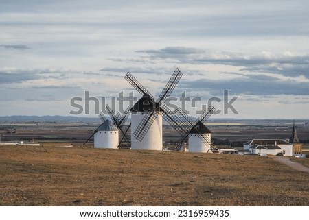 Sunset landscapes of Don Quixote windmills in Campo de Criptana, Toledo, Spain