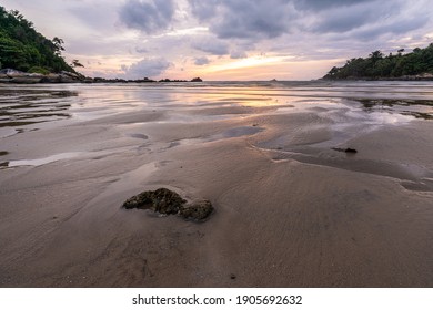 Sunset at Layan beach, lagoon in Phuket, Thailand during Low tide