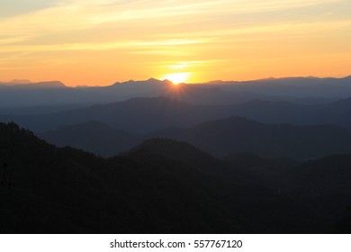 sunset and layer of mountain