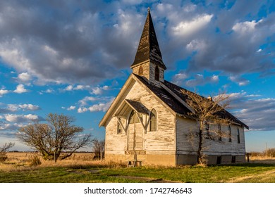 Sunset light on the abandoned Wartime United Church in Wartime, Saskatchewan, Canada - Powered by Shutterstock