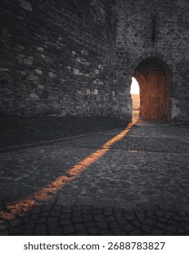 Sunset Light Through the Ancient Gate of Visegrád Castle, Hungary
