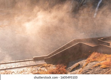 Sunset light through the mist at the bottom of the beautiful Montmorency Falls near Quebec City. 