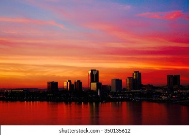 Sunset Long Beach Los Angeles California, Seen On The Brightly Colored Building And Sky