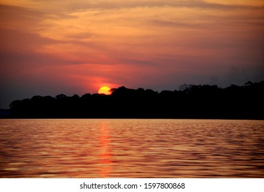 A Sunset From The Madre De Dios River