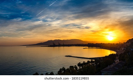 Sunset In Malaga Beach. Beautiful Landscape. Panorama.