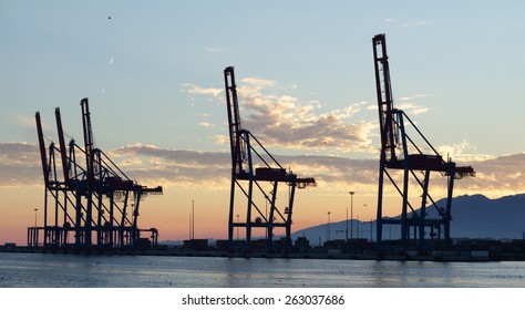 sunset malaga city port crane panorama spain 