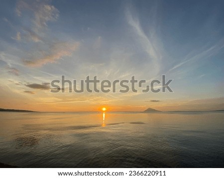 Sunset in Manado North Sulawesi looked Manado Tua Island and Bunaken Island